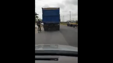 Dude Holds Onto The Back Of A Moving Truck From His Bicycle Then This Happened!